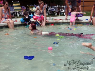 Mermaid Swimming in a Kiddie Pool Public Pool